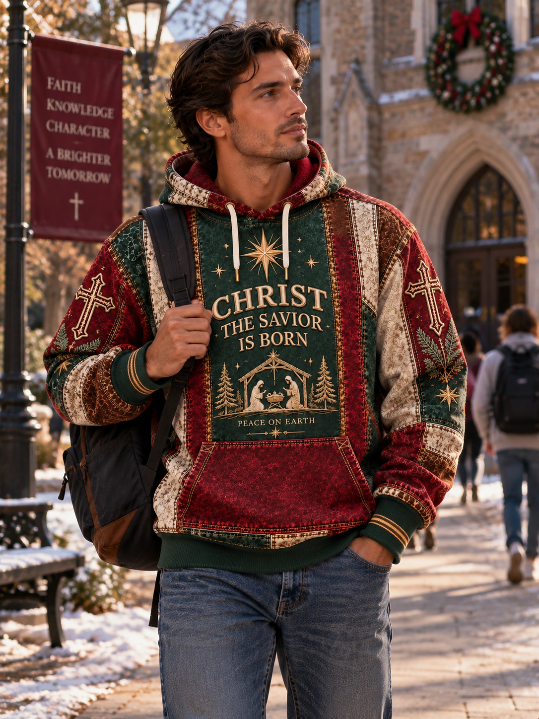 A man wearing a festive Christmas-themed hoodie with a graphic that reads 'CHRIST THE SAVIOR IS BORN' walks outdoors in front of a historic stone building with snow on the ground.