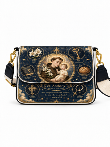 A rectangular shoulder bag with a dark navy blue background printed with a detailed St. Anthony religious illustration and gold decorative elements, shown on a plain white background.