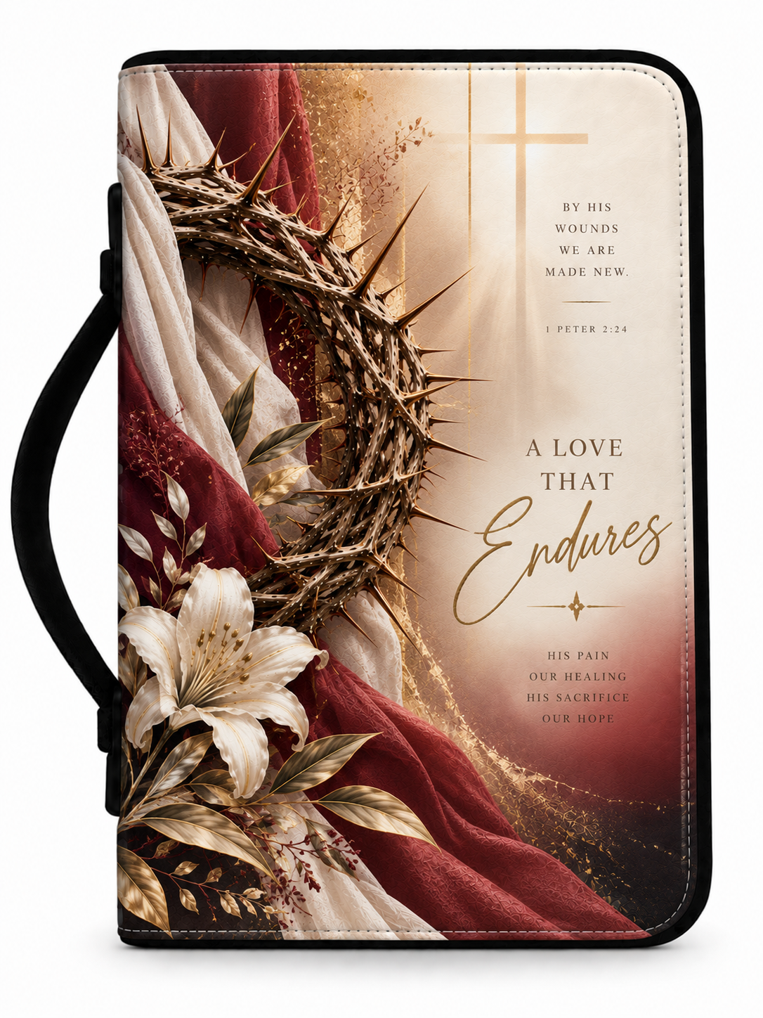A Bible journal with a black handle, featuring a religious cover design with a crown of thorns, white lilies, red and cream drapery, a gold cross, and the text 'A LOVE THAT Endures' and 'BY HIS WOUNDS WE ARE MADE NEW'.
