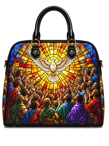 A structured black handbag with double top handles and gold-tone hardware, featuring a colorful stained-glass-style religious print of a dove above a crowd of people, shown on a plain white background.