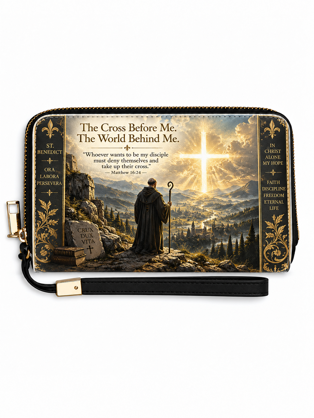 A zip-around wallet with a wrist strap, featuring a detailed religious illustration of a robed figure facing a glowing cross over a mountainous landscape. The design includes gold ornamental borders, French text, and a black wrist strap with gold hardware.