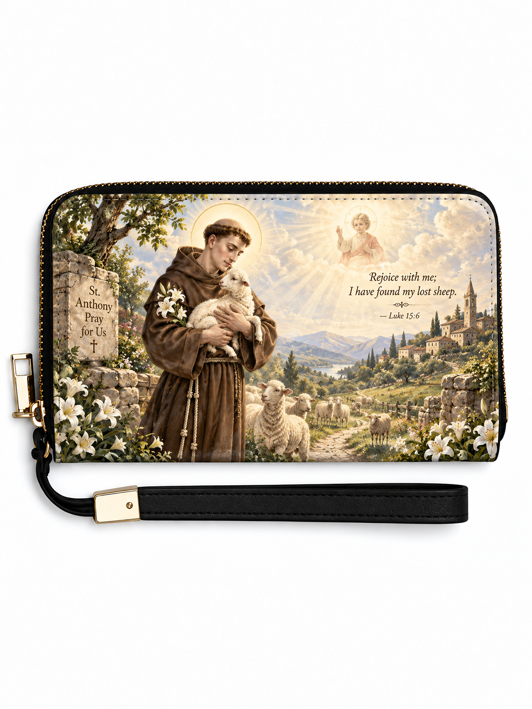 A zip-around wallet with a black wrist strap, featuring a printed religious scene of Saint Francis of Assisi holding a sheep, with white lilies, a stone sign, a shepherd, mountains, and a heavenly figure in the background. The wallet is shown on a plain white background.