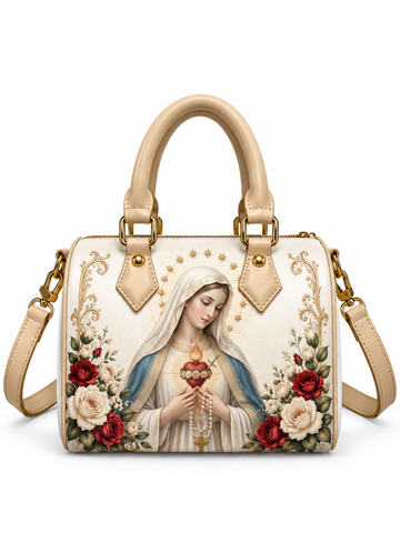 A structured beige handbag with a printed image of the Virgin Mary holding a flaming heart, surrounded by red and white roses and gold decorative borders. The bag has beige leather top handles, a matching shoulder strap, and gold-tone hardware.