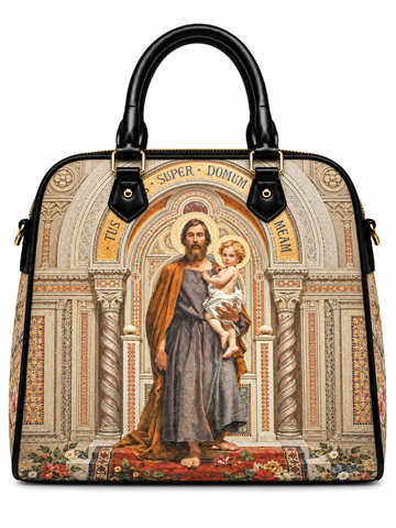 A structured black leather handbag with a large front print depicting Jesus and the child Christ in an ornate classical architectural scene. The bag has double top handles, gold-tone hardware, and is shown against a plain white background.