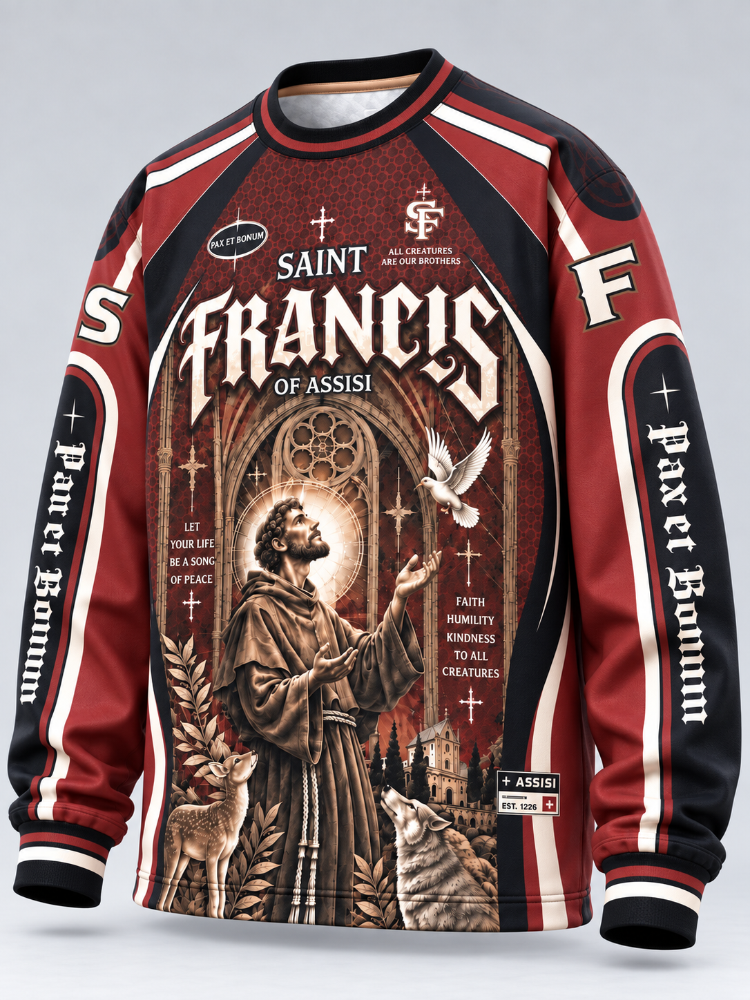 A long-sleeve crewneck sweatshirt featuring a detailed graphic print of Saint Francis of Assisi. The design has a dark red and black color scheme with white text and accents, showing an illustration of Saint Francis, a dove, a deer, and a wolf.