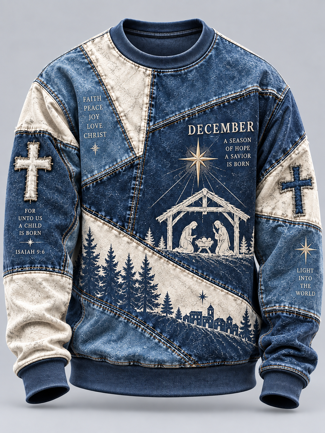 A long-sleeve crewneck sweatshirt with a distressed blue denim and cream-colored patchwork design, featuring a Christmas nativity scene graphic on the front with text including 'DECEMBER' and religious verses.