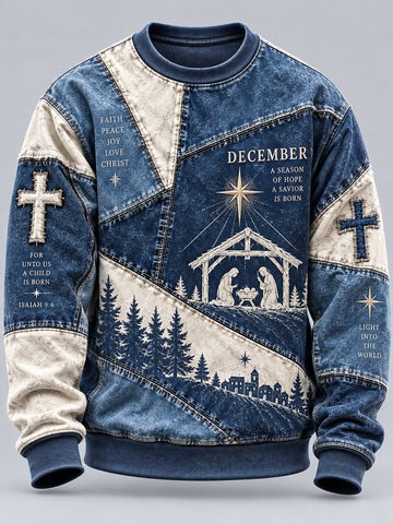 A long-sleeve crewneck sweatshirt with a distressed blue denim and cream-colored patchwork design, featuring a Christmas nativity scene graphic on the front with text including 'DECEMBER' and religious verses.