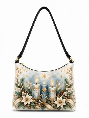 A shoulder bag with a black strap and a cream-colored body, decorated with a festive Christmas illustration featuring two lit candles, gold stars, poinsettias, pine branches, and ribbons on a white background.