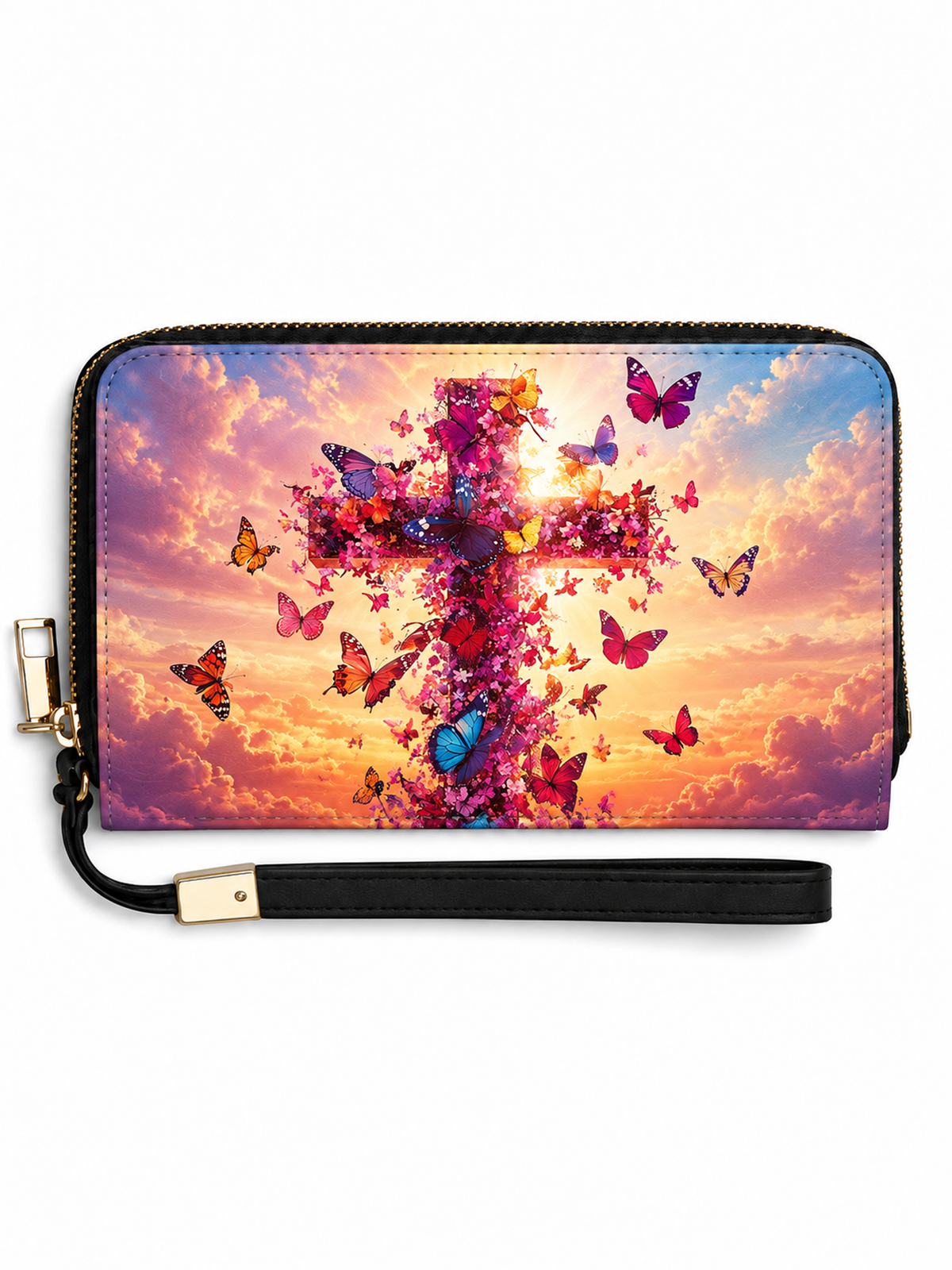 A zip-around wristlet wallet with a black wrist strap and gold-tone hardware, featuring a vibrant printed design of a cross made of flowers and butterflies against a colorful sunset sky.